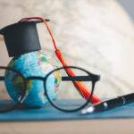Graduation Cap With Earth Globe. Concept Of Global Business Stud
